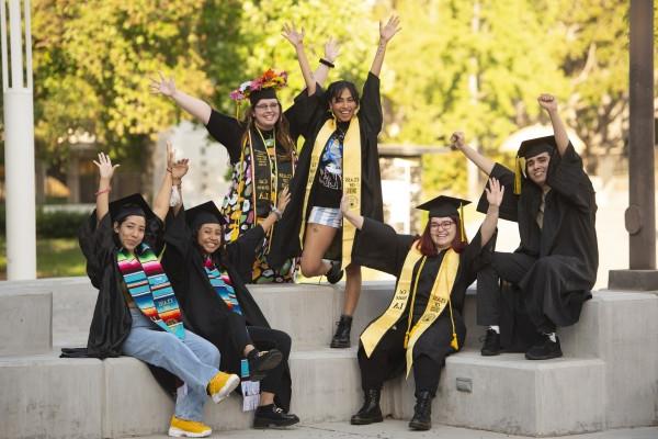 students celebrating graduation